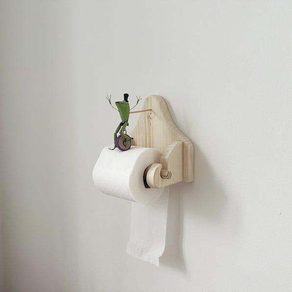 Frog On Unicycle Toilet Paper Holder