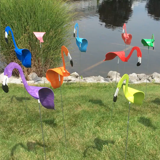 A whimsical and dynamic bird that spins with the slight garden breeze